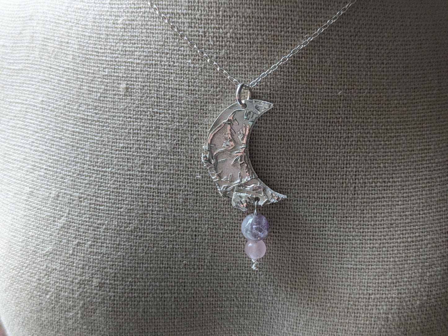 Solid silver crescent moon pendent with semi-precious stones