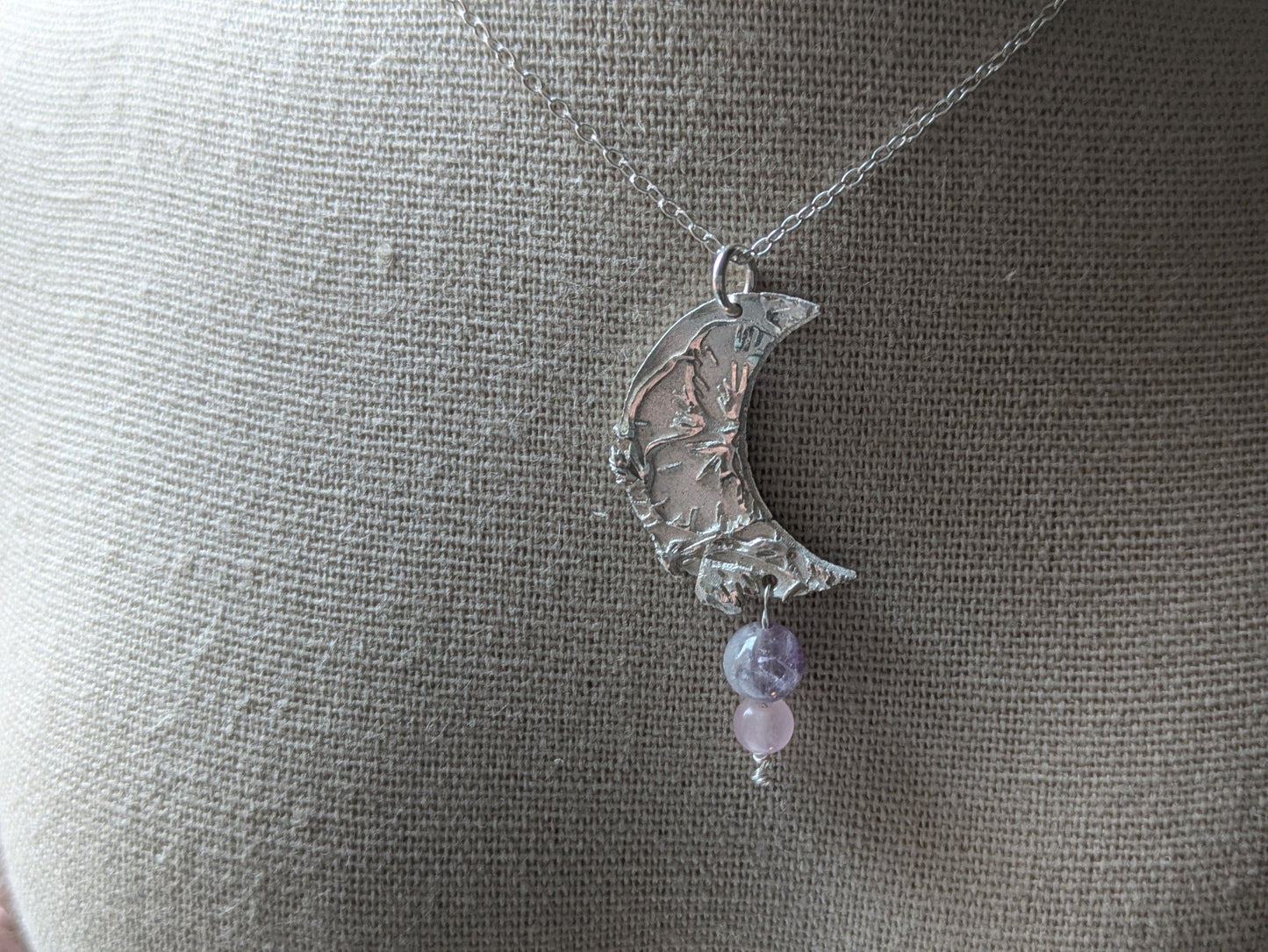 Solid silver crescent moon pendent with semi-precious stones