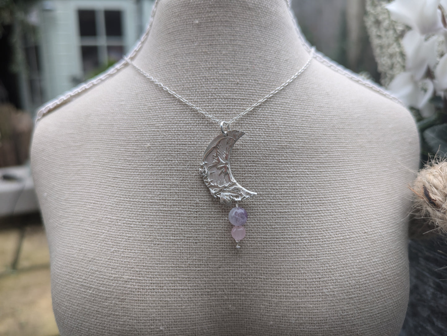 Solid silver crescent moon pendent with semi-precious stones